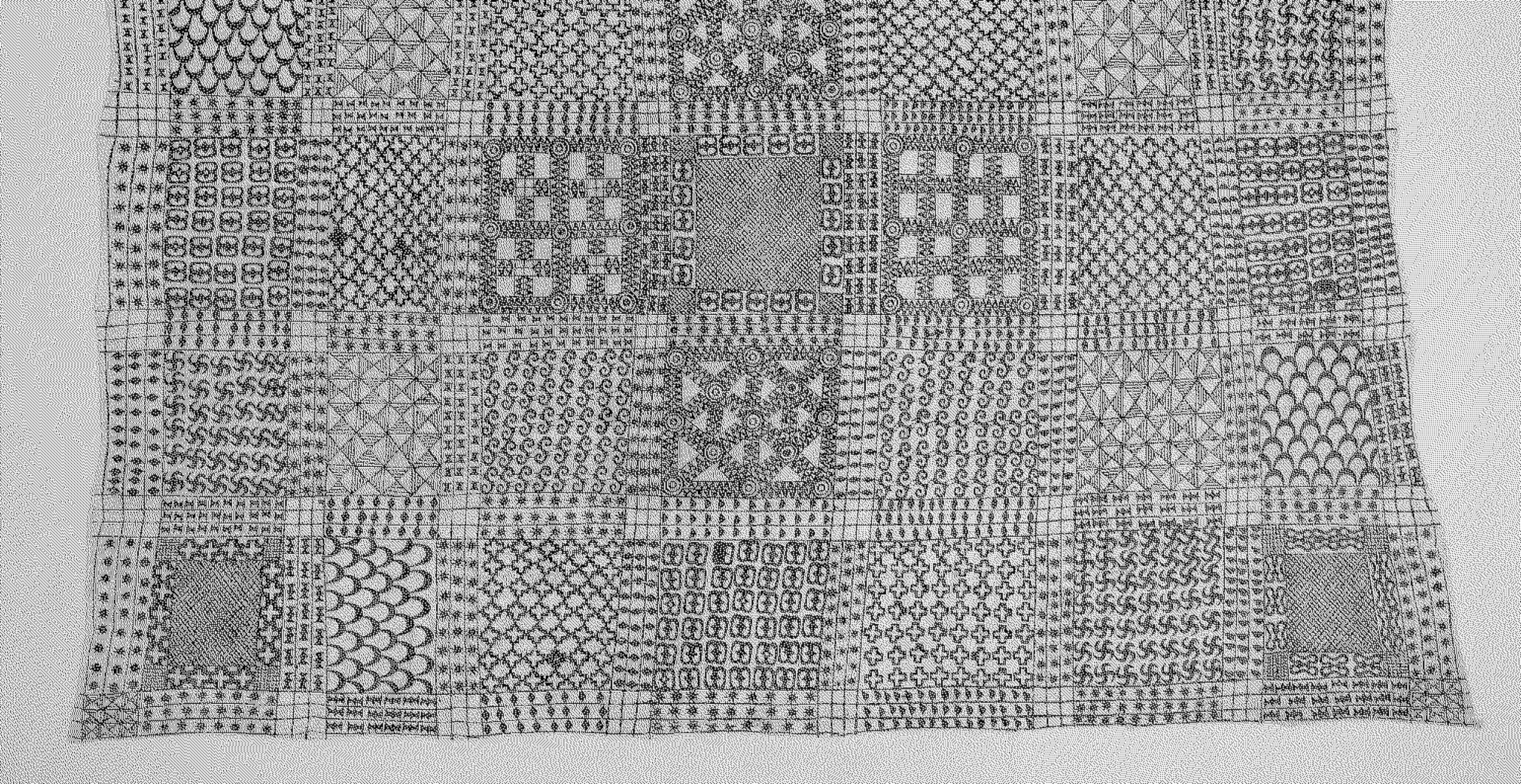 Photograph. A pale brown textile features an intricate, detailed design. The pattern of the textile is arranged into a grid formation, with squares resembling tiles, and each square ‘tile’ features its own unique geometric pattern. Rows of three intersecting lines run between the tiles, and in these are more elements of decorative pattern.