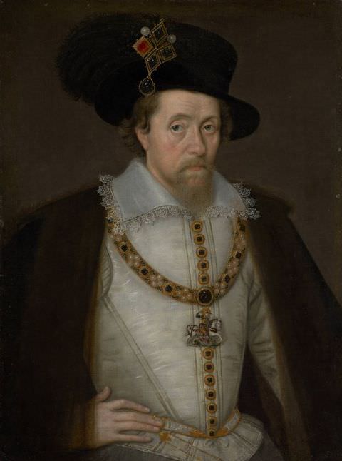 Painting. A colour portrait of a man seen from head to waist, dressed in formal attire, including a brown cape, a white, corseted jacket with a large white lace lined collar, and a large black hat adorned with feathers and jewels on one side.