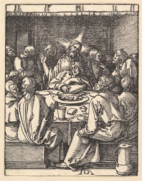 Print. A black and white illustration showing a crowd of people wearing long robes, surrounding a circular table which contains the remnants of a meal, with scattered crockery, cutlery, and food. 
