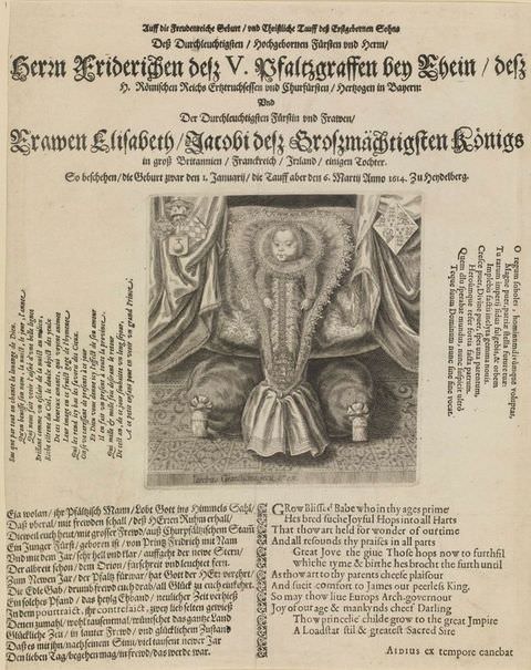 Print. This book page features passages of text in upper- and lower-case ornate font in black on a white background. In the centre of the page is an illustration of a baby adorned in elaborate clothing including silky fabric and a decorated ruff collar, lying on a background within an indulgently decorated interior.