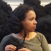 Sonia E. Barratt in profile amidst mound of hair